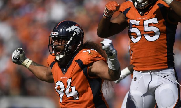 Domata Peko (94) of the Denver Broncos celebrates a plat during the second quarter against the Oakl...