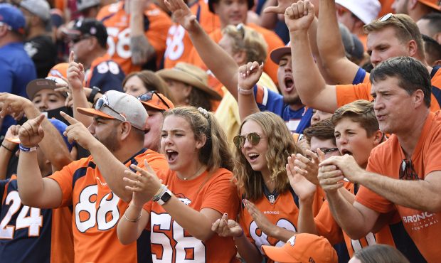 Denver Broncos fans cheer during the fourth quarter against the Oakland Raiders. The Denver Broncos...