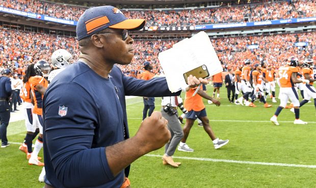 Head coach Vance Joseph of the Denver Broncos pumps his fist after the fourth quarter of the Bronco...