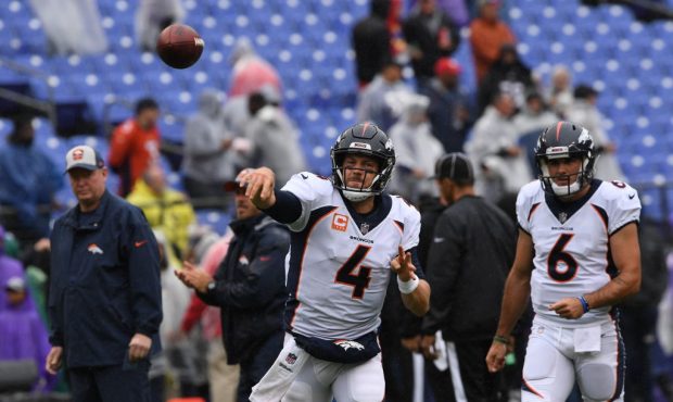 Denver Broncos quarterback Case Keenum #4 warming up as they visit the Baltimore Ravens at M&T ...