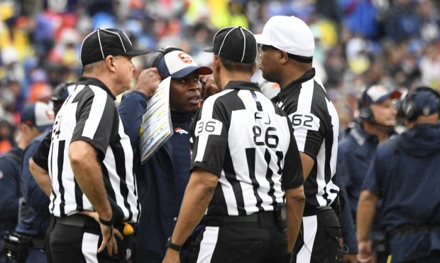Denver Broncos head coach Vance Joseph talking to the ref's in the second half against the Baltimor...