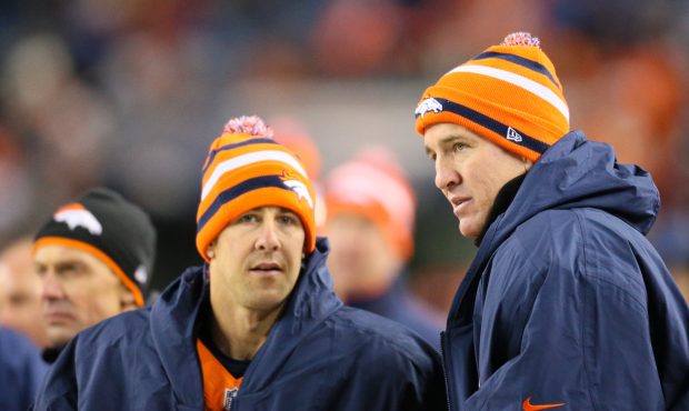 Denver Broncos quarterback Peyton Manning (18) with wide receiver Brandon Stokley (14). (Photo by R...