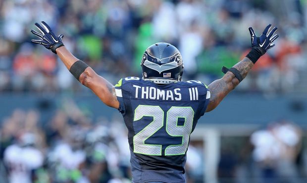SEATTLE, WA - SEPTEMBER 21:  Free safety Earl Thomas #29 of the Seattle Seahawks celebrates an inte...