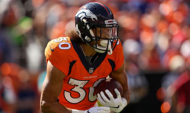 DENVER, CO - SEPTEMBER 16:  Running back Phillip Lindsay #30 of the Denver Broncos carries the ball...