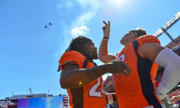 DENVER, CO - SEPTEMBER 16:  Defensive back Adam Jones #24 and offensive tackle Garett Bolles #72 of...