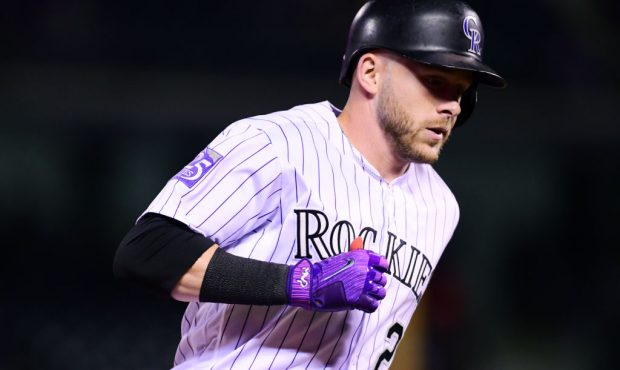 DENVER, CO - SEPTEMBER 5: Trevor Story #27 of the Colorado Rockies rounds third base after hitting ...