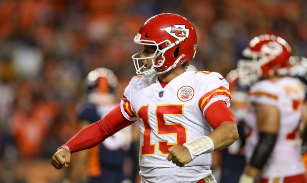 Quarterback Patrick Mahomes #15 of the Kansas City Chiefs reacts after a fourth quarter go-ahead to...