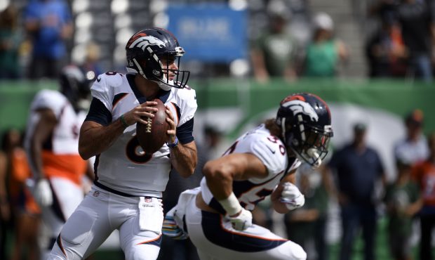 Quarterback Chad Kelly #6 of the Denver Broncos looks for a receiver during warmups on Sunday, Octo...