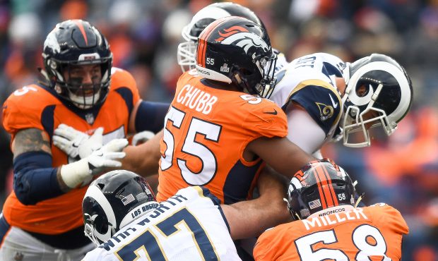 Linebacker Bradley Chubb #55 and linebacker Von Miller #58 of the Denver Broncos sack quarterback J...