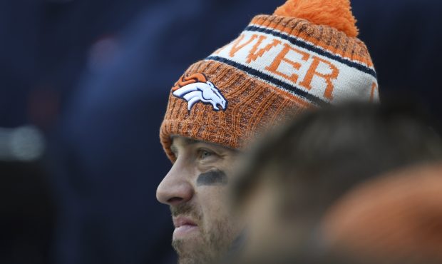 Denver Broncos Case Keenum #4 watches the action on the field as the Broncos take on the Los Angele...