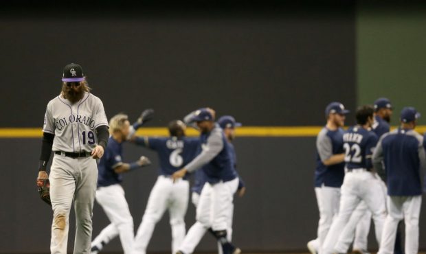 MILWAUKEE, WI - OCTOBER 04:  Charlie Blackmon #19 of the Colorado Rockies walks off the field as th...