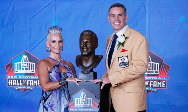 CANTON, OH - AUGUST 05: Kurt Warner and wife Brenda Warner pose his bust during the Pro Football Ha...