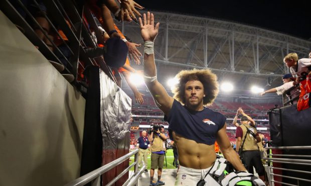 GLENDALE, AZ - OCTOBER 18:  Runningback  Phillip Lindsay #30 of the Denver Broncos waves to fans as...