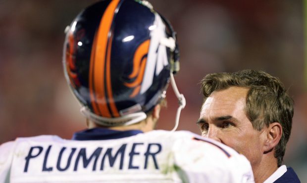 KANSAS CITY, MO - NOVEMBER 23:  Quarterback Jake Plummer #16 talks with head coach Mike Shanahan of...