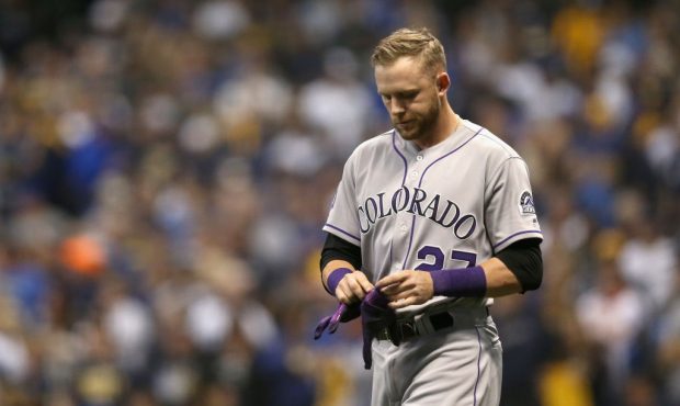 MILWAUKEE, WI - OCTOBER 05:  Trevor Story #27 of the Colorado Rockies walks off the field after str...