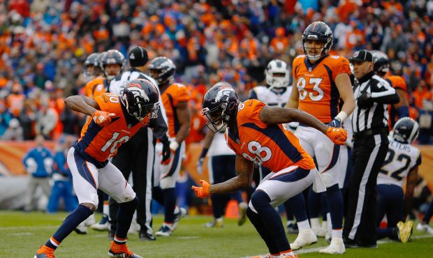 Wide receiver Emmanuel Sanders #10 of the Denver Broncos celebrates his third-quarter touchdown wit...