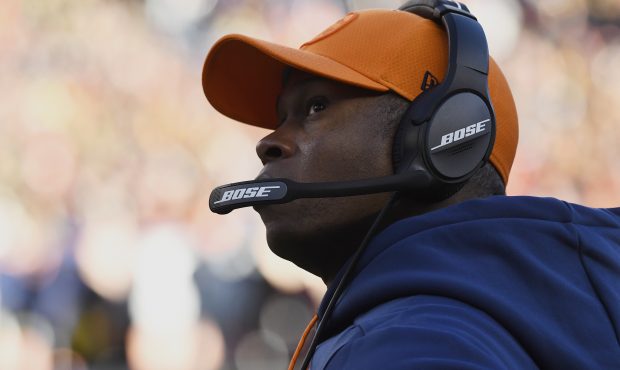 Head coach Vance Joseph of the Denver Broncos looks at the scoreboard during the second quarter aga...