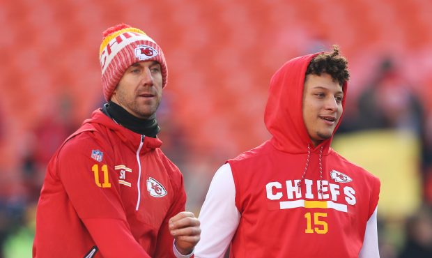 Kansas City Chiefs quarterbacks Alex Smith (11) and Patrick Mahomes (15) warm up before the AFC Wil...