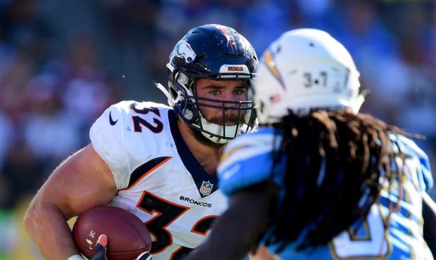 CARSON, CA - OCTOBER 22:  Andy Janovich #32 of the Denver Broncos runs after his catch in front of ...