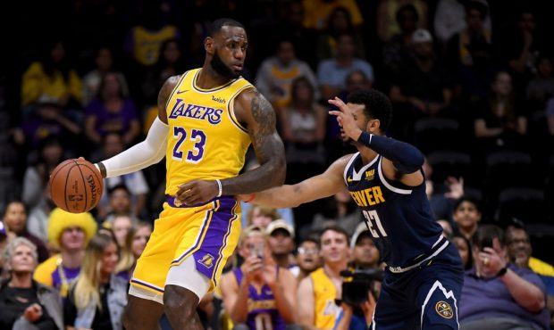 SAN DIEGO, CA - SEPTEMBER 30:  LeBron James #23 of the Los Angeles Lakers posts up Jamal Murray #27...