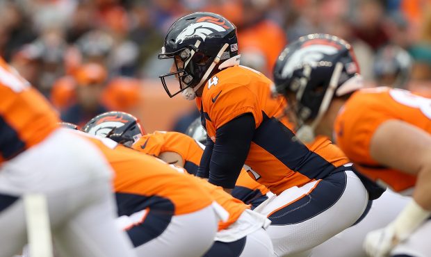 Quarterback Case Keenum #4 of the Denver Broncos plays the Los Angeles Chargers at Broncos Stadium ...