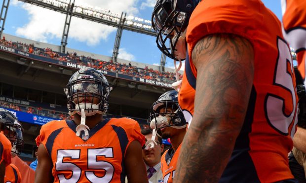 DENVER, CO - SEPTEMBER 16:  Linebacker Bradley Chubb #55 of the Denver Broncos stands in a group of...