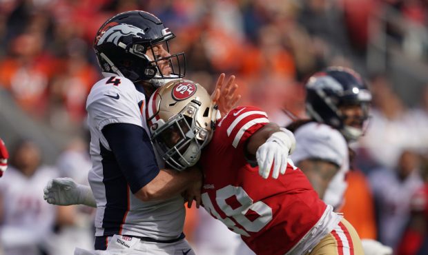 SANTA CLARA, CA - DECEMBER 09: Case Keenum #4 of the Denver Broncos is hit by Fred Warner #48 of th...