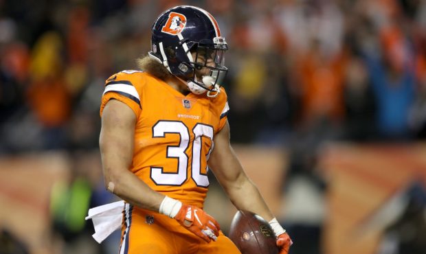 DENVER, CO - NOVEMBER 25:  Phillip Lindsay #30 of the Denver Broncos celebrates scoring a touchdown...