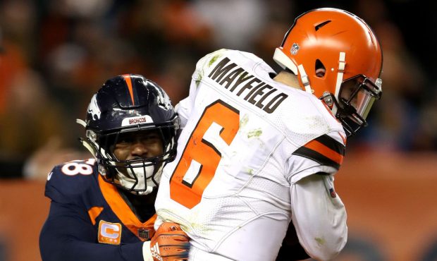 DENVER, COLORADO - DECEMBER 15: Von Miller #58 of the Denver Broncos sacks quarterback Baker Mayfie...