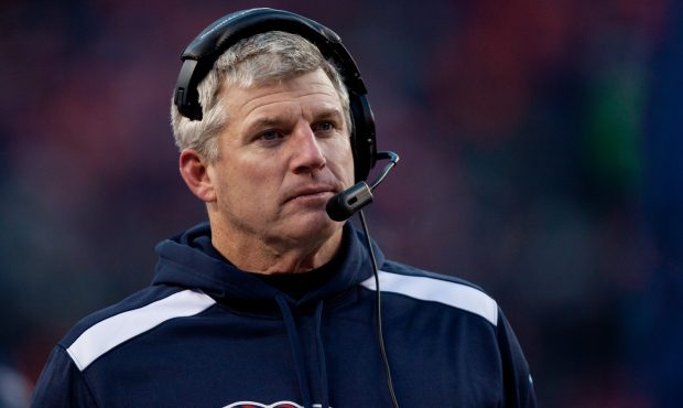 Head coach Mike Munchak of the Tennessee Titans looks on during a game against the Denver Broncos a...