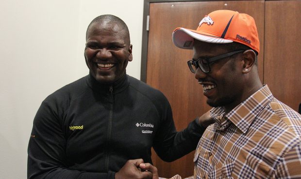 ENGLEWOOD, CO - APRIL 29:  Von Miller of the Denver Broncos is congratulated by former Bronco lineb...