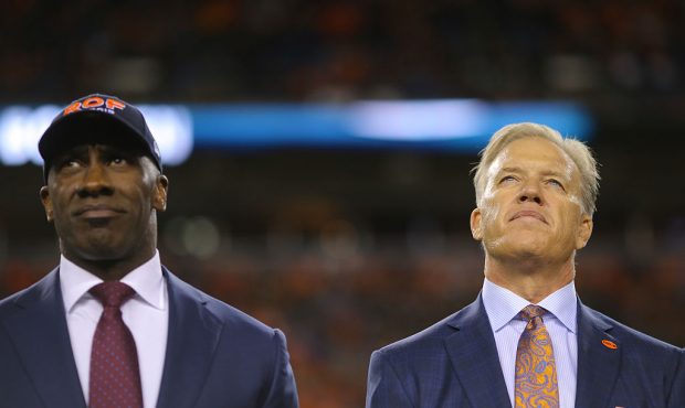 DENVER, CO - NOVEMBER 01:  (L-R) Former Denver Bronco Shannon Sharpe and ohn Elway, General Manager...