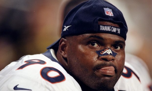 8 Aug 1998:  Defensive end Neil Smith #90 of the Denver Broncos looks on during a pre-season game a...