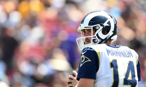 Sean Mannion #14 of the Los Angeles Rams looks to pass during a preseason game against the Houston ...