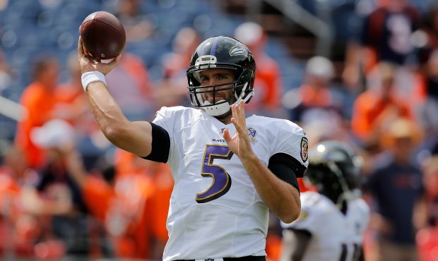 Quarterback Joe Flacco #5 of the Baltimore Ravens warms up prior to facing the Denver Broncos at Sp...