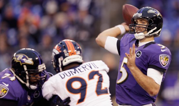 BALTIMORE, MD - DECEMBER 16: Quarterback Joe Flacco #5 of the Baltimore Ravens gets off a pass whil...