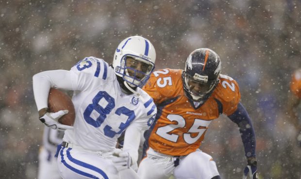 DENVER - NOVEMBER 24:   Wide receiver Qadry Ismail #83 of the Indianapolis Colts catches a crucial ...