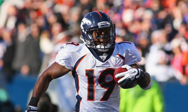 ORCHARD PARK, NY - DECEMBER 24: Eddie Royal #19 of the Denver Broncos runs back a kickoff against t...