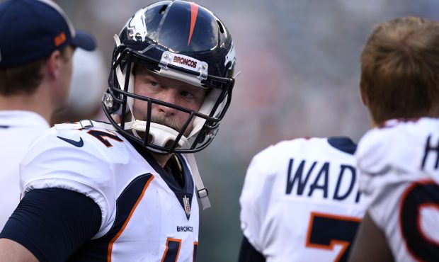 Long snapper Casey Kreiter #42 of the Denver Broncos looks toward the fans on the sideline during t...
