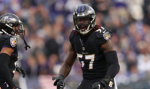 Inside Linebacker C.J. Mosley #57 of the Baltimore Ravens reacts after a play in the fourth quarter...