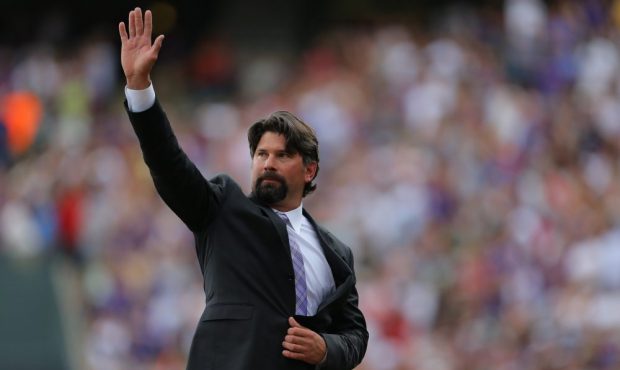 Former first baseman Todd Helton #17 of the Colorado Rockies waves to the crowd during a ceremony t...