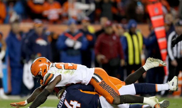 DENVER, COLORADO - DECEMBER 15: Jabrill Peppers #22 of the Cleveland Browns sacks quarterback Case ...