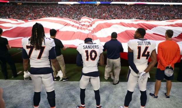 GLENDALE, AZ - OCTOBER 18: Offensive tackle Billy Turner #77, wide receiver Emmanuel Sanders #10 an...