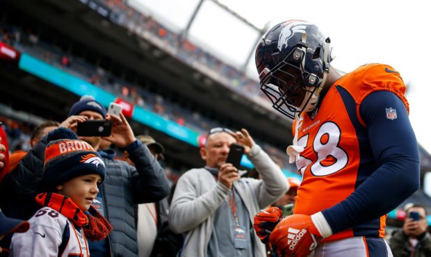 DENVER, CO - DECEMBER 30:  Outside linebacker Von Miller #58 of the Denver Broncos signs autographs...