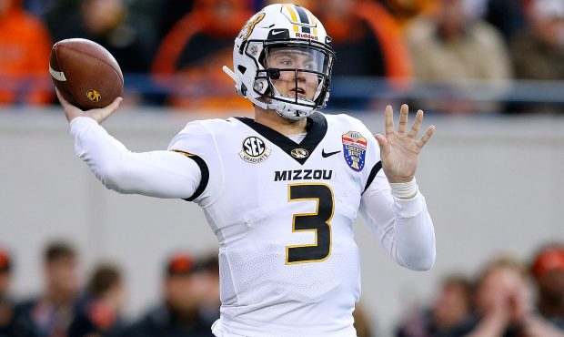 MEMPHIS, TENNESSEE - DECEMBER 31: Drew Lock #3 of the Missouri Tigers throws the ball against the O...