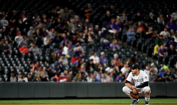 Nolan Arenado #28 of the Colorado Rockies during a review late in the game as the Colorado Rockies ...