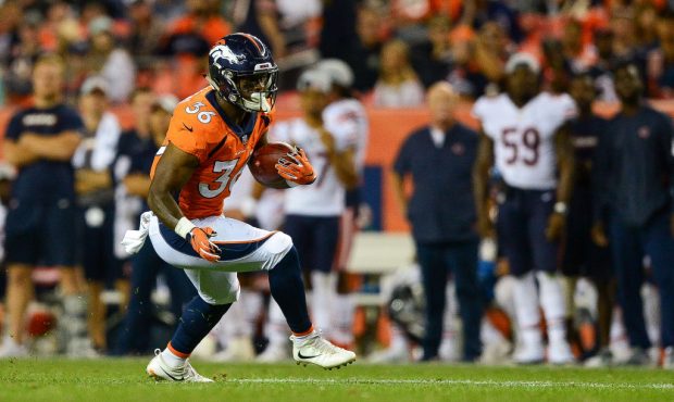 Running back David Williams #36 of the Denver Broncos rushes against the Chicago Bears during an NF...