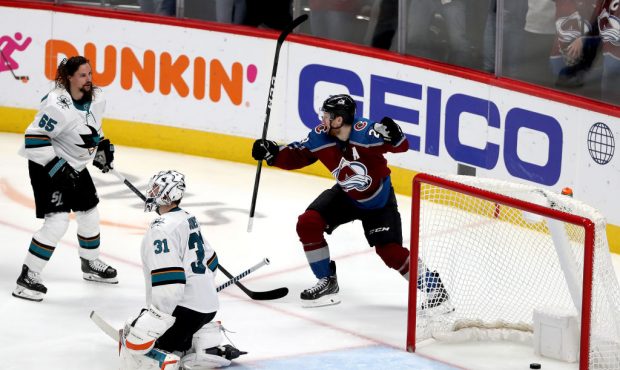 DENVER, COLORADO - MAY 06: Nathan MacKinnon #29 of the Colorado Avalanche celebrates Gabriel Landes...