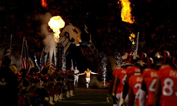 DENVER, CO - NOVEMBER 12:  Cornerback Chris Harris #25 of the Denver Broncos runs onto the field du...