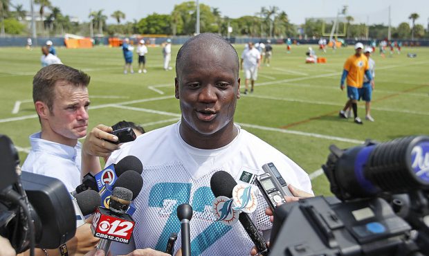 DAVIE, FL - MAY 23: Ja'Wuan James #72 of the Miami Dolphins answers questions from the media after ...